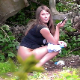 A plump, Eastern-European girl is voyeuristically recorded taking a shit in an outdoor location while speaking on her cell phone. Unfortunately, the poop action cannot be seen due to obstructing vegetation. Presented in 720P HD. Over 1.5 minutes.